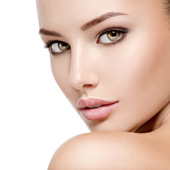 Beautiful face of young woman with perfect health fresh skin