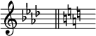 { \omit Score.TimeSignature \key aes \major s8^"" \bar "||" \key c \major s^""}