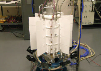 The MSL MMRTG exterior. The white Aptek 2711 coating reflects sunlight while still transmitting heat to the Martian atmosphere