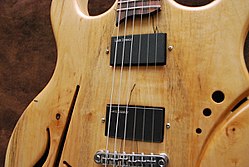 A Nitro-Hemi Lace Sensor on a hand-made Girouard Guitar.