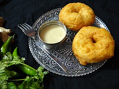 Medu vadas served with coconut chutney