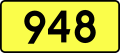 English: Sign of DW 948 with oficial font Drogowskaz and adequate dimensions.