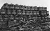 Former Pacific Electric Railway streetcars stacked and awaiting destruction in 1956