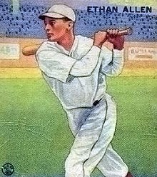 A baseball card of a man in a white baseball uniform swinging a baseball bat