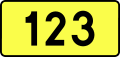 English: Sign of DW 123 with oficial font Drogowskaz and adequate dimensions.