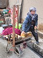 A man in Kabul selling the ingredients for goat Siri paya