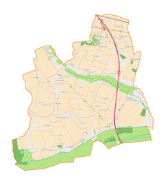 Mapa konturowa gminy Krzyżanów, na dole nieco na prawo znajduje się punkt z opisem „Młogoszyn”