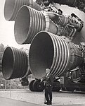 Dr. von Braun Standing by Five F-1 Engines of the Saturn V Dynamic Test Vehicle, 1969. NASA, public domain