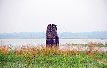 Old temple in front of a river