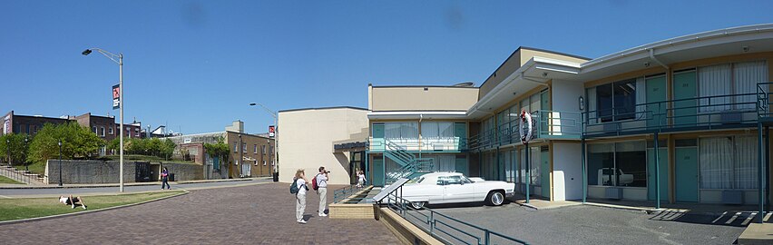 Wide view of the Lorraine Motel and the boarding house from which James Earl Ray fired the fatal shot from a second-floor bathroom window (to the left of the light pole)