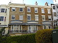 Cream coloured mathematical tiles on houses in Marine Square Location on Google Maps