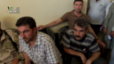 Muhammad Mustafa Ali (left) and Shervan Derwish (right) in Qabasin, July 2013, then as commanders of the Kurdish Front. They would later become commanders of the Northern Sun Battalion.