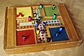 Image 13Parcheesi is an American adaptation of a Pachisi, originating in India. (from Game)