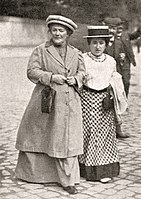 Clara Zetkin (left) with Rosa Luxemburg (right) in January 1910. Zetkin partly initiated International Women's Day.