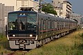 先頭車間転落防止幌を装備した中間運転台 クモハ207-1057