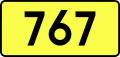 English: Sign of DW 767 with oficial font Drogowskaz and adequate dimensions.