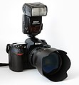 25. Nikon D200-as fényképezőgép objektívvel és vakuval (javítás)/(csere)