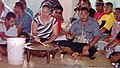 A typical informal faikava in Tonga with the touʻa serving the men.