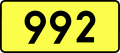 English: Sign of DW 992 with oficial font Drogowskaz and adequate dimensions.