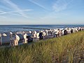 * Nomination: The beach of Zingst, Germany. At the horizon, you can see the island of Hiddensee. --Indeedous 23:03, 14 March 2013 (UTC) * Review  Comment less sky is better imo --Rjcastillo 02:09, 15 March 2013 (UTC)