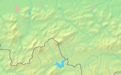 Mapa Beskidu Żywieckiego, Małego i Makowskiego z zaznaczoną granicą Polski, w centrum znajduje się punkt z opisem „Dawna lokalizacja chatki”