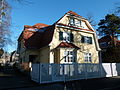 Villa mit Einfriedung