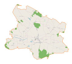 Mapa konturowa gminy Grabowiec, blisko centrum na dole znajduje się punkt z opisem „Kościół parafialny pw. Św. Mikołaja Biskupa w Grabowcu”