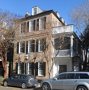 Thomas Legare House, ca 1759. An outstanding example of an early Georgian style Charleston single house well adapted to the narrow lot purchased in 1752. In 1816 an adjacent house was demolished to provide space for the walled garden and elegant Regency piazzas