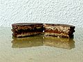 * Nomination Español: Alfajor Havanna de chocolate en porciones --Ezarate 23:53, 6 March 2013 (UTC) * Withdrawn Strong JPEG compression level and visible artifacts. Can you correct it--Grondin 18:00, 8 March 2013 (UTC) Comment I tried to reduce the artifacts, I uploaded a new version --Ezarate 14:36, 11 March 2013 (UTC)I'm afraid that causes a loss of quality of the picture, rather unsharp in the details.--Grondin 17:26, 11 March 2013 (UTC)