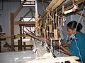 An Assamese woman using a traditional Handloom for weaving Mekhela Chadors in the Mahila Samiti workshop in Tezpur