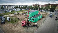 Aufbau des Containerdorfes auf der Exe