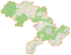 Mapa konturowa gminy Kartuzy, po prawej znajduje się owalna plamka nieco zaostrzona i wystająca na lewo w swoim dolnym rogu z opisem „Jezioro Klasztorne Duże”