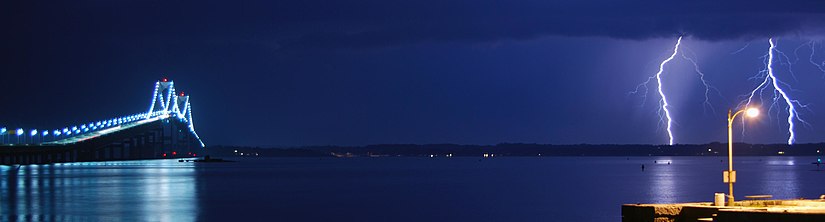 The Claiborne Pell Newport Bridge with lightning