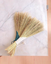 two turkey tail brooms made from broom corn