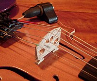 Piezoelectric violin bridge pickup