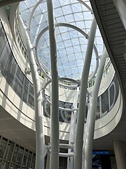 Grand Hall atrium, with Jenny Holzer's work White Light visible behind the central columns