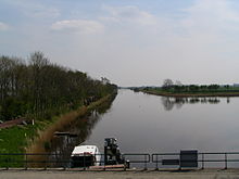 Gezicht vanaf de sluis op de monding van de Munnekezijlsterried voor de sluis