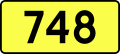 English: Sign of DW 748 with oficial font Drogowskaz and adequate dimensions.