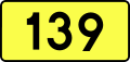 English: Sign of DW 139 with oficial font Drogowskaz and adequate dimensions.