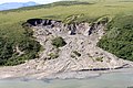 Image 3Permafrost thaws as the Arctic warms, undermining infrastructure and releasing methane in a positive feedback loop.[3]