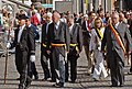 Patrick Moenaert, Mayor of Bruges (left), and Paul Breyne, Governor of Western Flanders (right), both in morning dress along with formal trousers at the Sanguis procession in Bruges, Belgium.