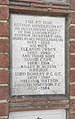 Plaque dedicated to Henderson, his parents and siblings at Golders Green Crematorium.