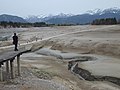 Winter in Germany, low level of lake Forggensee, Ammergauer Alpen.