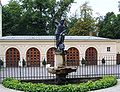 Statue of Neptune in front of Carriage House