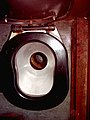 4 Toilet seat modified for squatting or sitting. Shows how German trains have adapted to the influx of immigrants who grew up squatting.