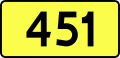 English: Sign of DW 451 with oficial font Drogowskaz and adequate dimensions.