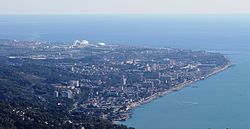 The coastal resort of Adler as seen from the Mount Akhun, 9 kilometres (5.6 mi) to the northwest