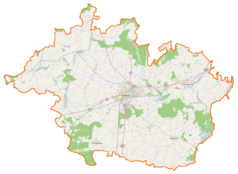 Mapa konturowa powiatu gnieźnieńskiego, blisko dolnej krawiędzi po prawej znajduje się punkt z opisem „Mielżyn”