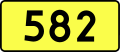 English: Sign of DW 582 with oficial font Drogowskaz and adequate dimensions.