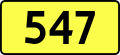 English: Sign of DW 547 with oficial font Drogowskaz and adequate dimensions.